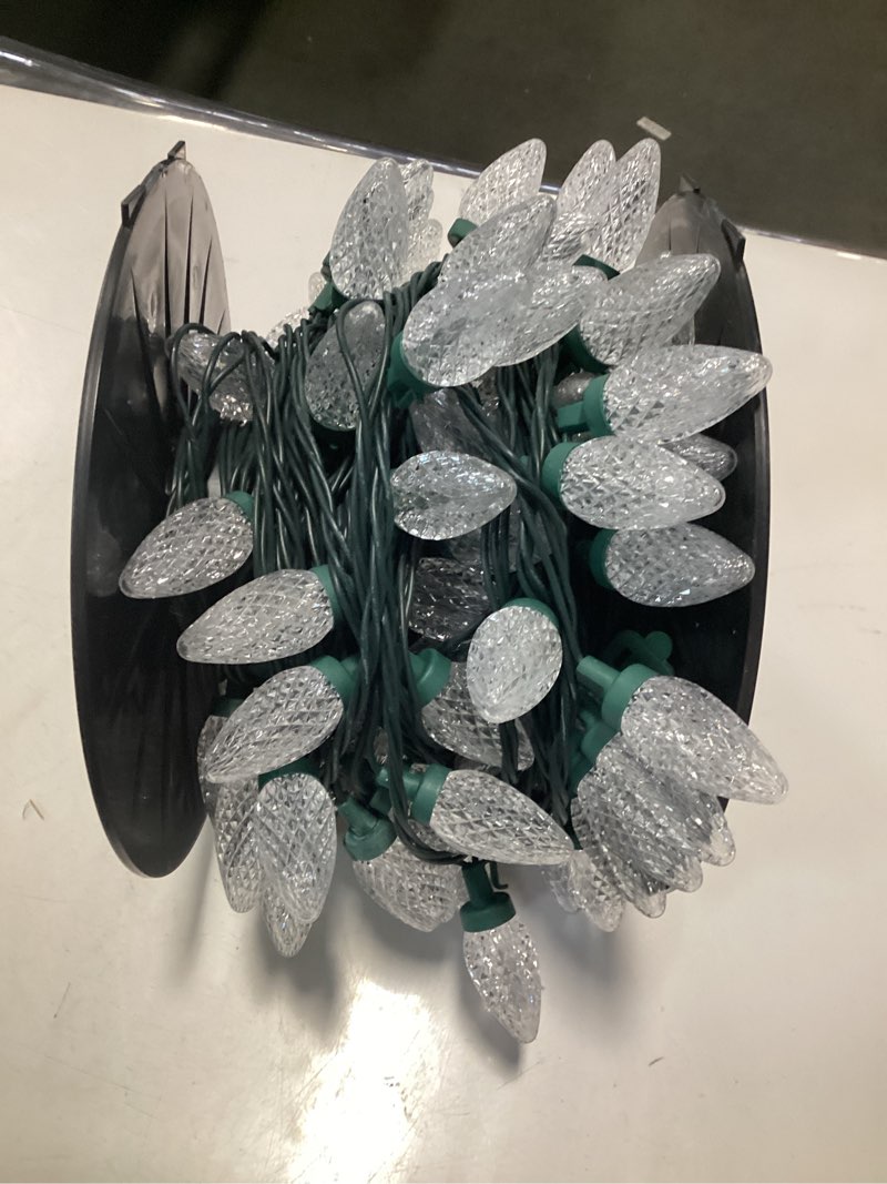 Condition photo showing As Is for Brightown C9 Christmas String Lights White, 66ft 100 LED Faceted Christmas Lights on Green Wire, Plug-in Large Bulb Strawberry String Lights for House Roof Roofline Christmas Tree Party Outdoor