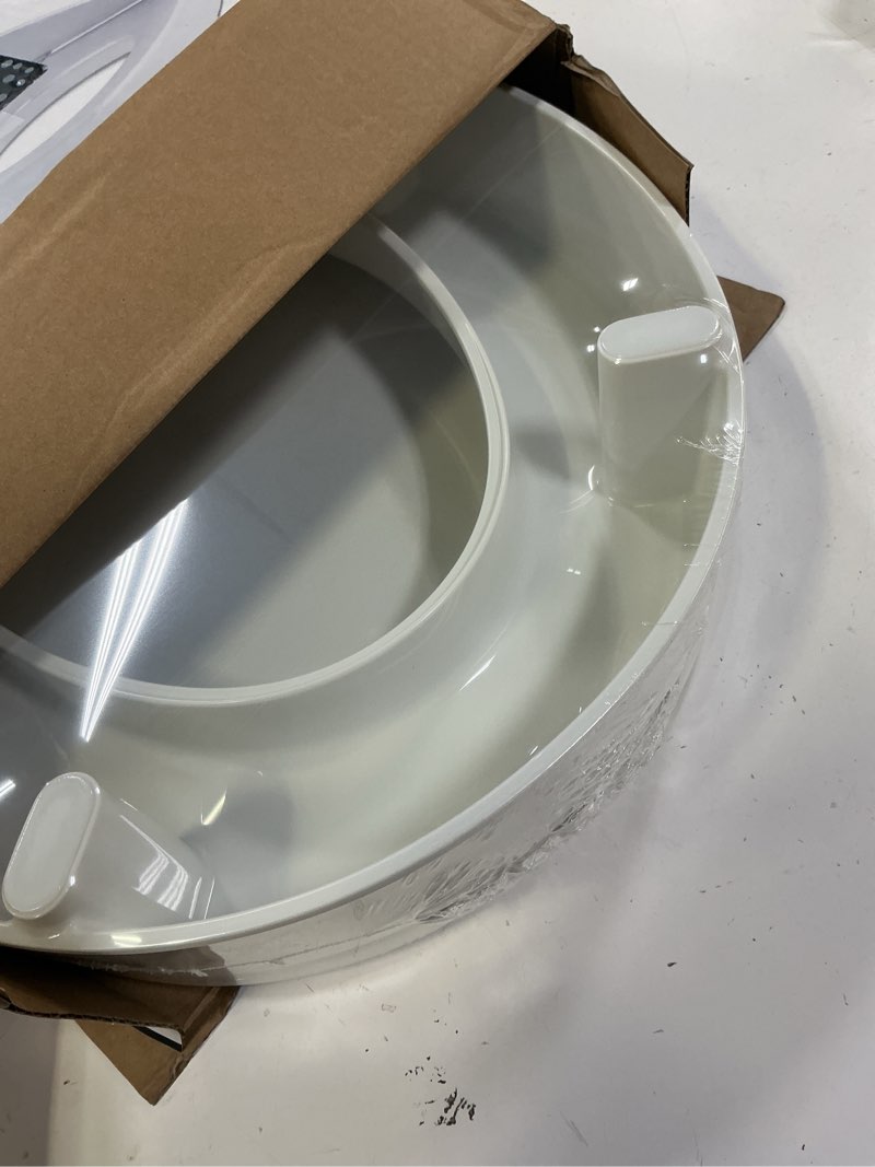 Condition photo showing Good Condition for kohler 25876-0 hyten 3" height, elevated soft close round toilet seat, contoured seat with grip-tight bumpers, quick-attach hardware, white white round