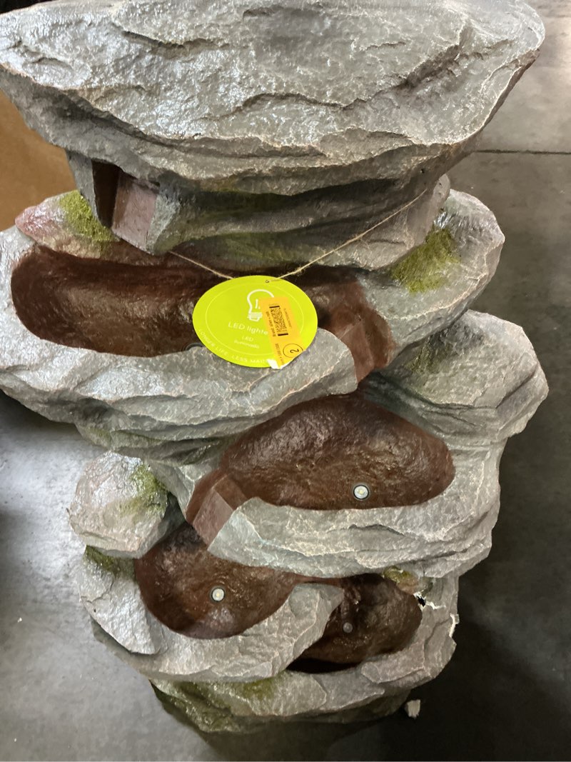 Condition photo showing As Is for alpine corporation 39-in h resin tiered outdoor fountain pump included