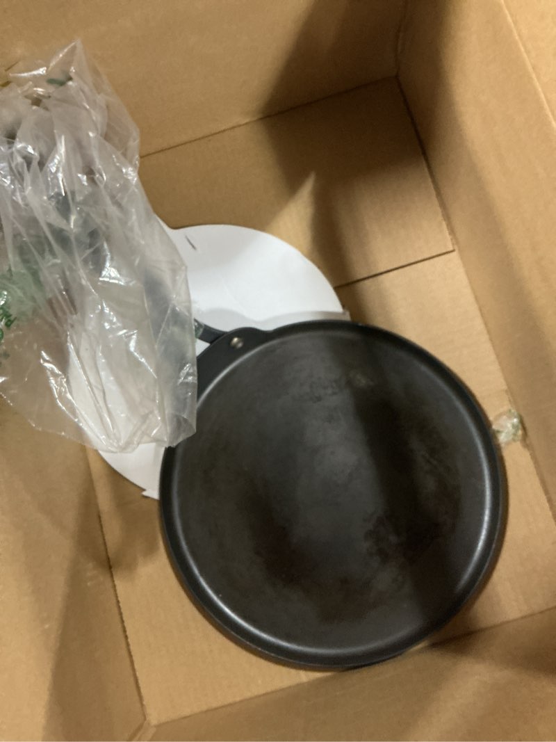 Condition photo showing As Is for OXO Obsidian Pre-Seasoned Carbon Steel, 10" Crepe and Pancake Griddle Pan with Removable Silicone Handle Holder, Induction, Oven Safe, Black