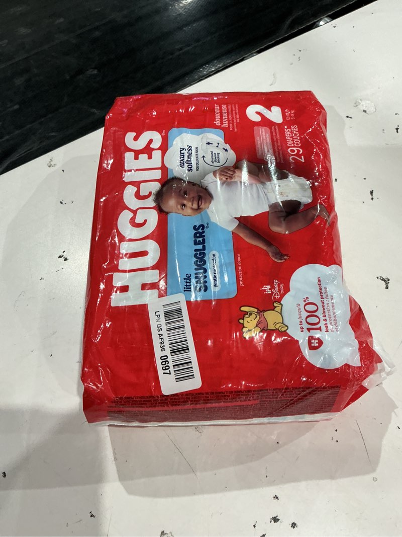 Condition photo showing New/Like New for huggies size 2 diapers, little snugglers baby diapers, size 2 (12-18 lbs), 29 count, packaging may vary size 2 29
