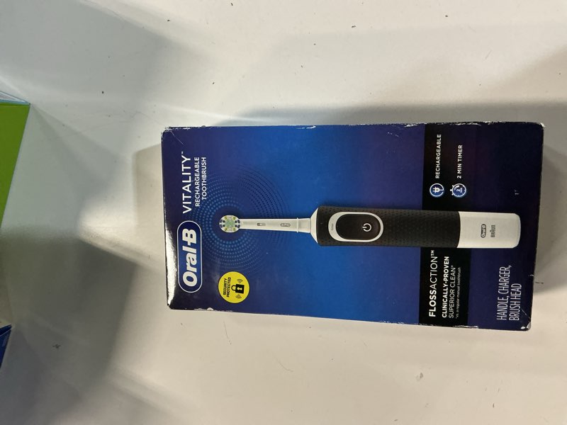 Condition photo showing New/Like New for oral-b vitality floss action rechargeable electric toothbrush  black  1 count