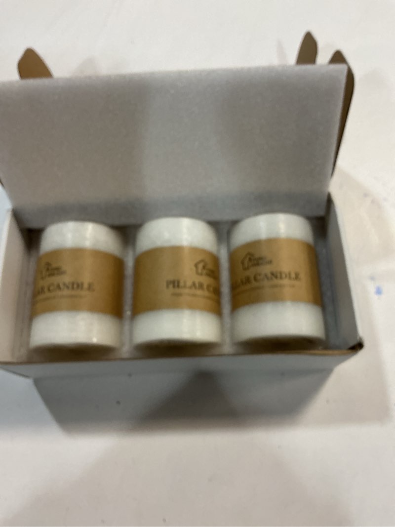 Condition photo showing New/Like New for 3x4 Inch White Pillar Candles Set of 3 - Decorative Unscented Pillar Candle, Long Burning Dripless Candles for Table Decor, Smokeless Large Pillar Candle for Wedding, Dinner, Rustic Home Decor White 3x4
