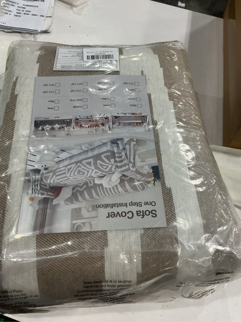 Condition photo showing New/Like New for OstepDecor Boho Couch Cover, Khaki Sofa Covers Washable, Sectional Couch Covers for Sofa L Shape, Chenille Sofa Blanket Cover, Non-Slip Sofa Slipcovers for Dogs, Pets, 71" x 150" Bohemia Khaki 71" x 150"