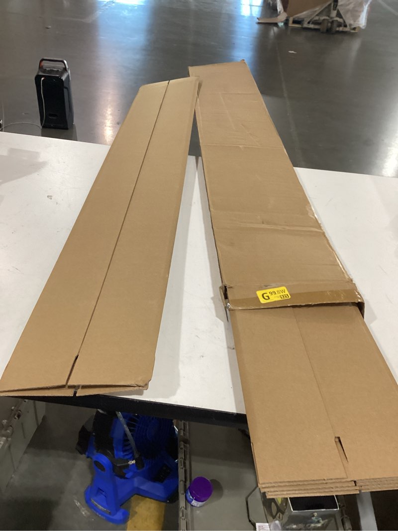 Condition photo showing As Is for rectangular triangle carton corrugated carton sun umbrella curtain rod floor mat