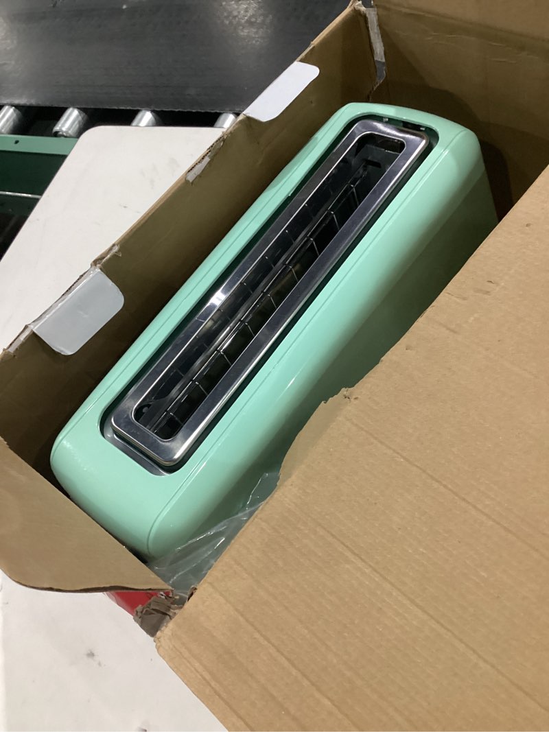 Condition photo showing As Is for DASH Clear View Toaster - Compact Design with 7 Browning Levels & Clear-View Window, Extra-Wide Slot Large Toaster, 1-Touch Defrost, Reheat & Bagel Functions - Easy Clean Up Crumb Tray (Aqua)