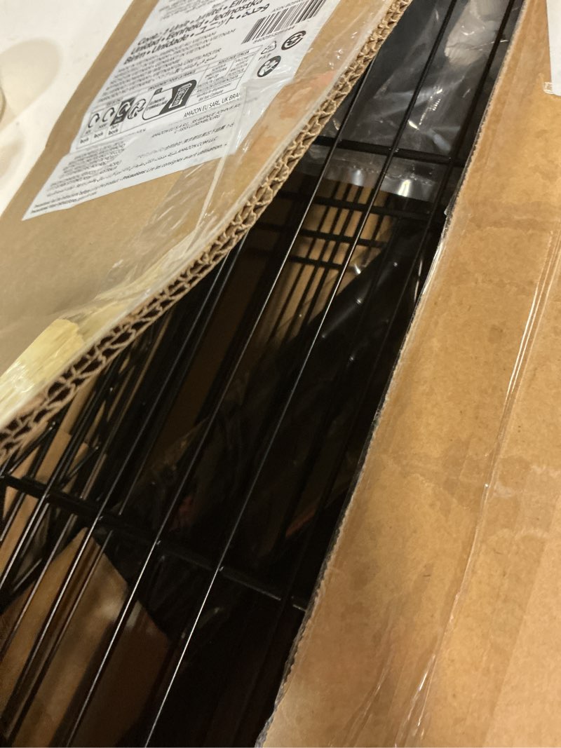 Condition photo showing Good Condition for amazon basics 4-shelf steel wire rack, 13.4 d x 23.2 w x 48 h in, black | sturdy, adjustable, easy assembly, storage 4-shelf black 13.4" d x 23.2" w x 48" h