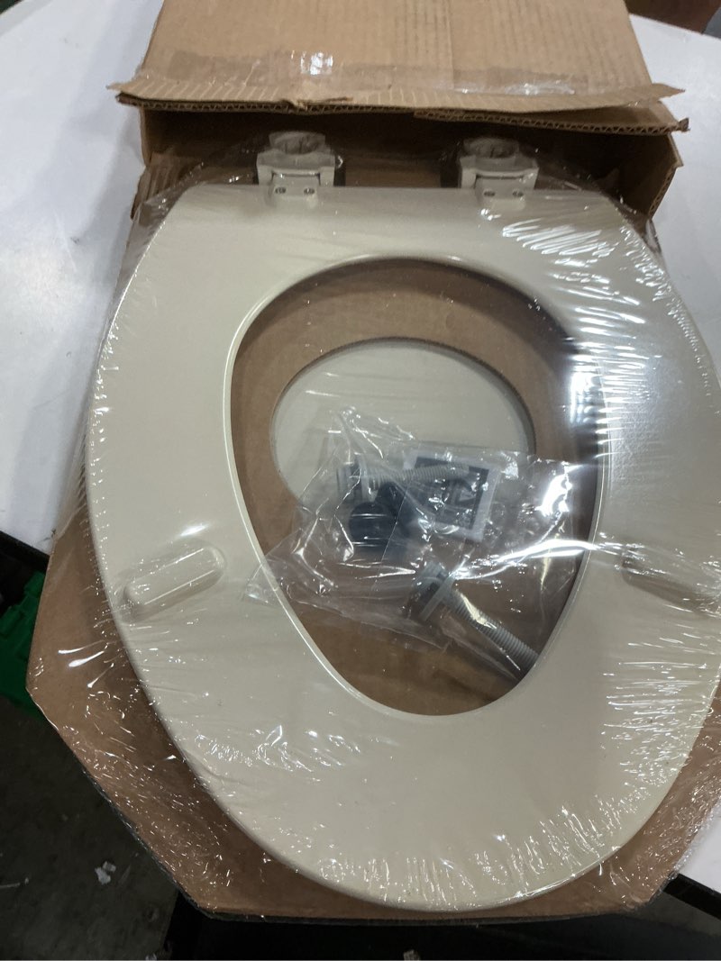 Condition photo showing New/Like New for bemis 1500ec 146 almond elongated molded wood toilet seat with easy-clean & change hinge