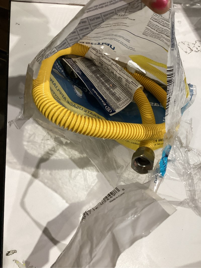 Condition photo showing As Is for Eastman 1/2 in. MIP in. X 1/2 in. D MIP 36 in. Stainless Steel Gas Appliance Connector