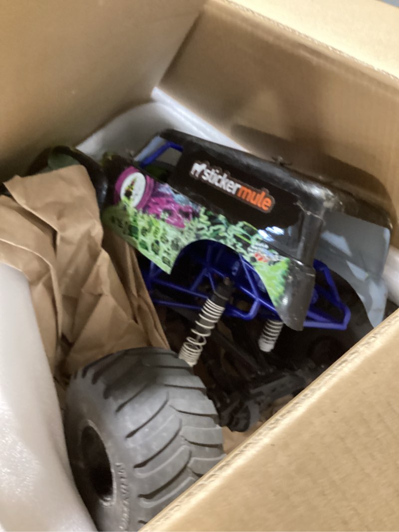 Condition photo showing As Is for losi lmt 2.0 4 wheel drive solid axle monster truck rtr - son-uva digger los04028t2 son uva digger
