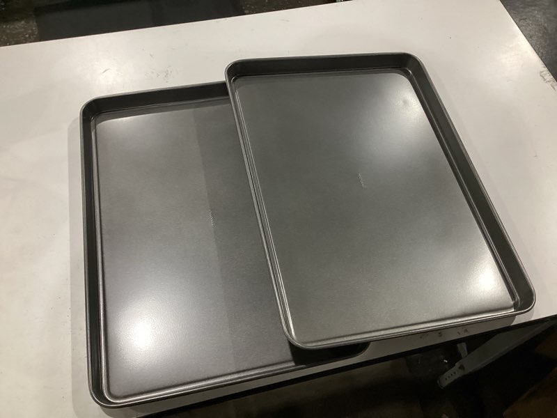 Condition photo showing New/Like New for goodcook everday nonstick carbon steel 15” x 21” baking sheet set, 2 pack – extra-large carbon steel cooking pans, bakeware set, cookie sheets for baking, oven pan set 15" x 21" (2-piece set)