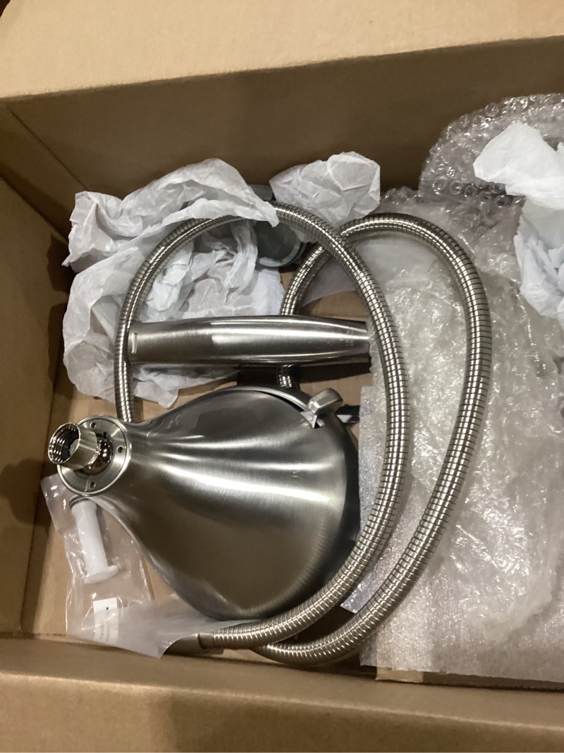 Condition photo showing As Is for incomplete delta shower head