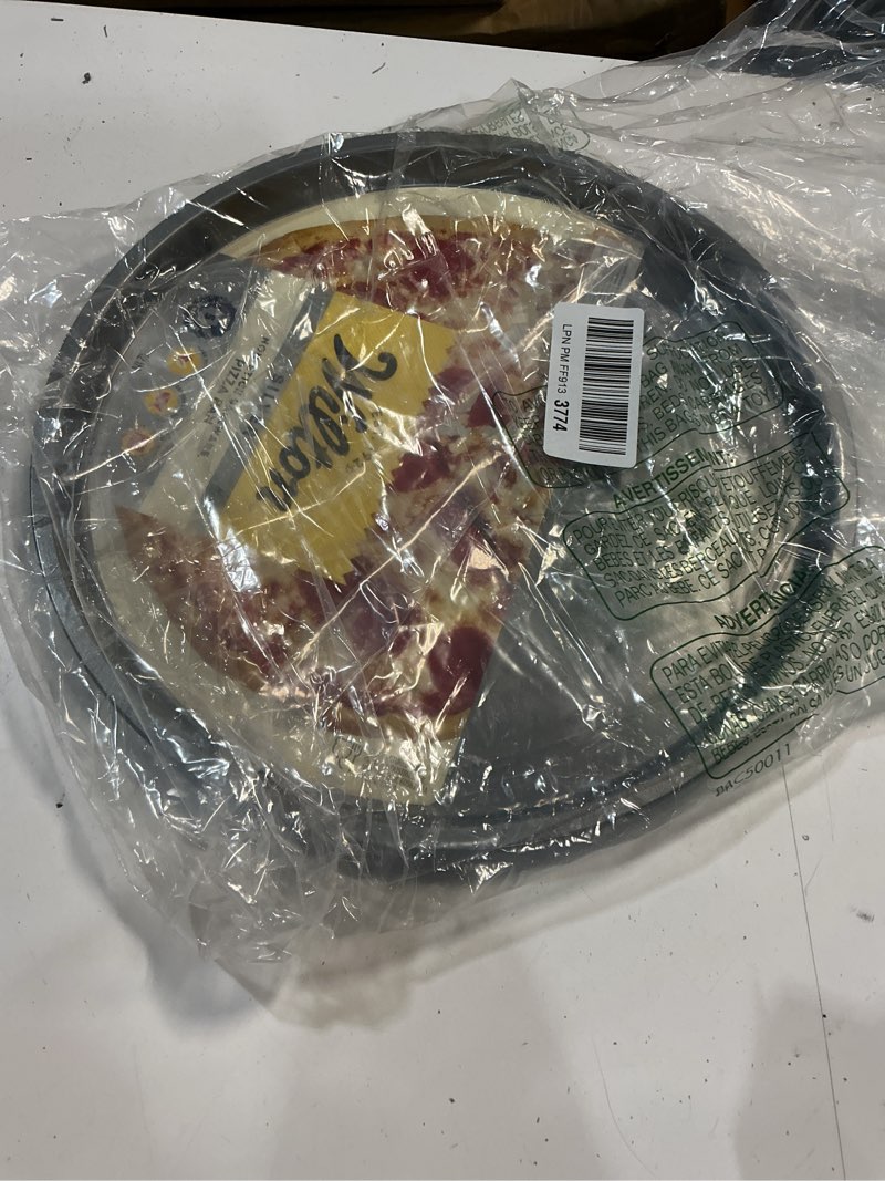 Condition photo showing Good Condition for wilton silver non stick 12 in. pizza pan, cold-rolled steel bakeware, made without pfas