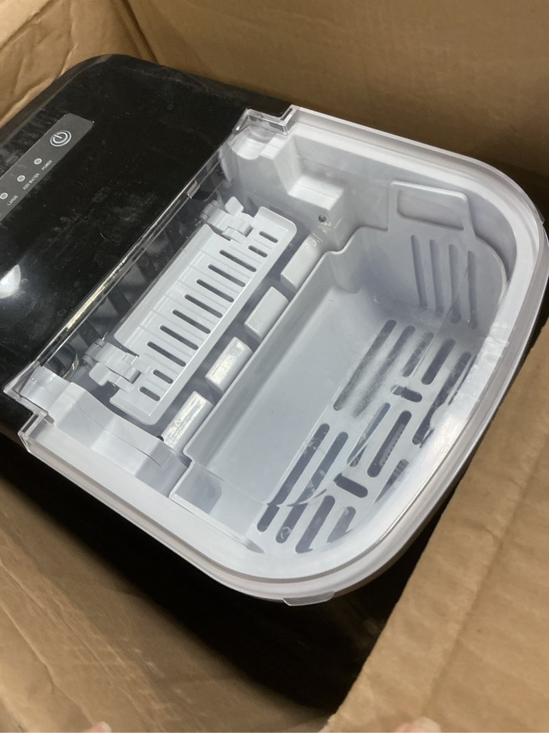 Condition photo showing As Is for 38lbs per day countertop ice maker, 9 ice cubes in 3.5 minutes, self-cleaning portable ice machine with 2 bullet sizes for kitchen, camping, rv, and party hs22-s 1