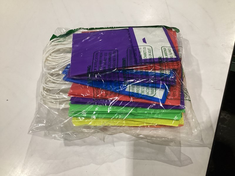 Condition photo showing New/Like New for SUNCOLOR 24-Pack Rainbow Gift Bags with Handles, 8" Multi-Color Paper Party Favor Bags for Goodies. Birthdays, Events, Classrooms & Celebrations