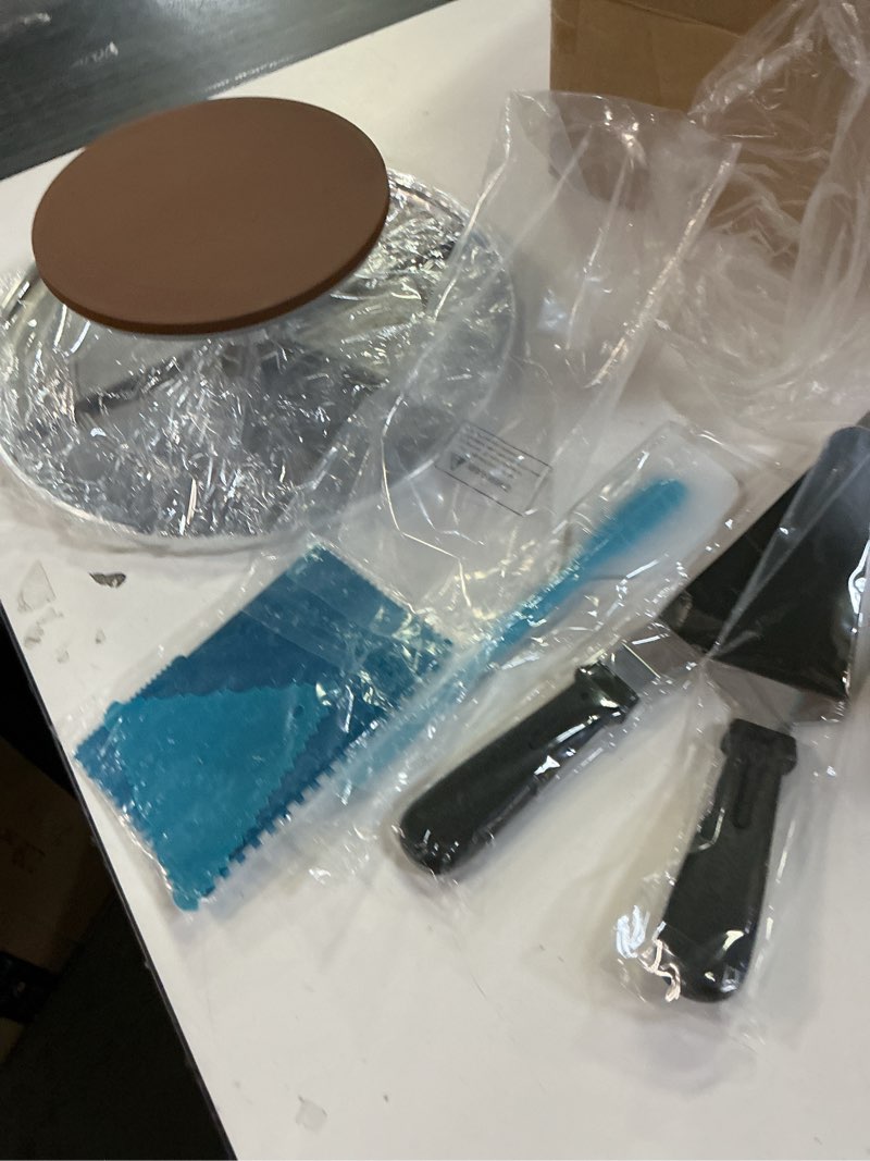 Condition photo showing New/Like New for Kootek Aluminium Cake Turntable Set, Baking Tools with Revolving 12" Cake Stand for Decorating, 12.7" Offset Spatula, 3 Stainless Steel Frosting Icing Smoother, Cake Serve Cake Decorating Kit Supplies