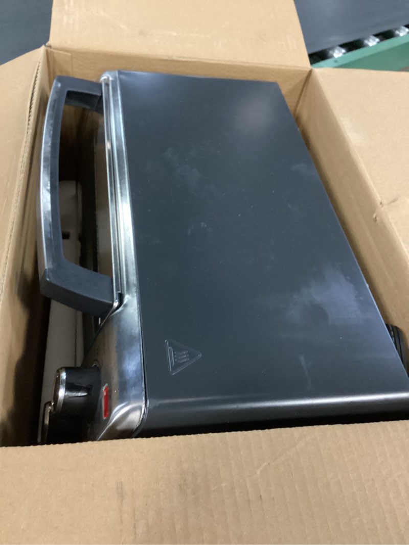 Condition photo showing As Is for BLACK+DECKER 4-Slice Convection Oven, Stainless Steel, Curved Interior Fits a 9 inch Pizza, TO1313SBD