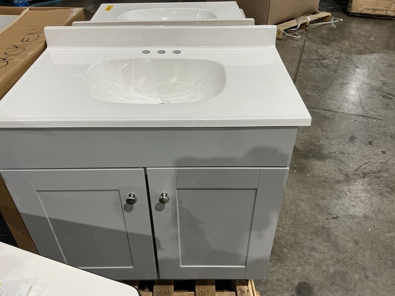 Condition photo showing Good Condition for project source dover 30-in light gray single sink bathroom vanity with white cultured marble top