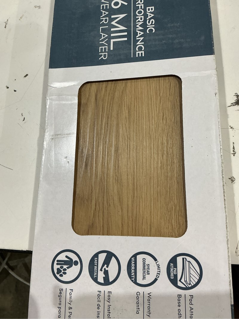 Condition photo showing As Is for style selections slate oak gray 6-mil x 6-in w x 36-in l waterproof interlocking luxury vinyl plank flooring (22.17-sq ft/ carton)