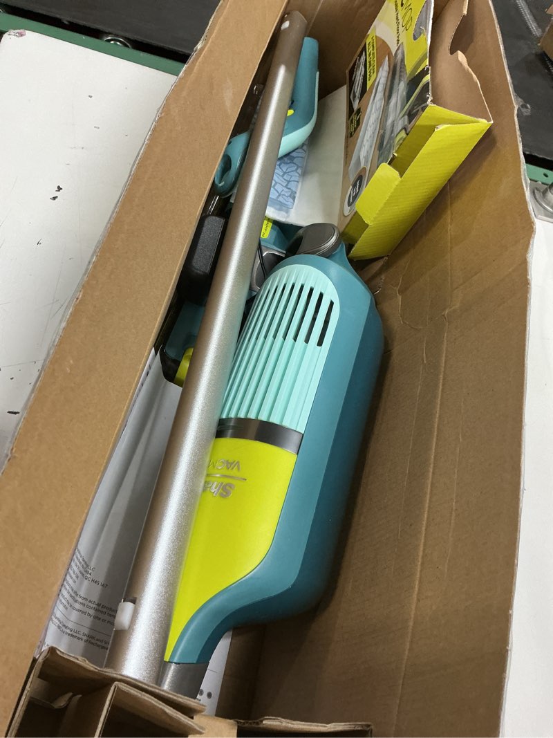 Condition photo showing As Is for shark vacmop reveal new cordless hard floor cleaner, vacuum & spray mop, powerful suction, lightweight, illumination light, includes 4 disposable pads, 12oz pet multi-surface cleaning solution, vm401
