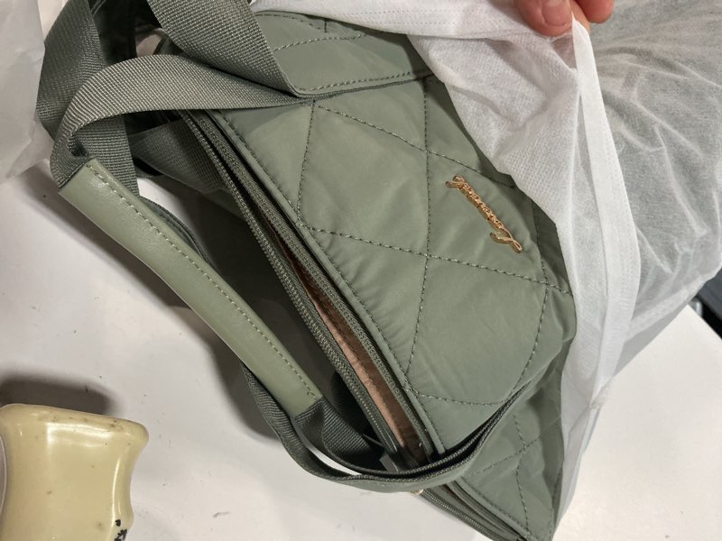 Condition photo showing Good Condition for lovevook travel duffle bag, puffer weekender bags for women with shoe compartment, carry on overnight bag, hospital bag for labor and delivery, gym duffel bag with wet pocket, 2pcs set dark green large