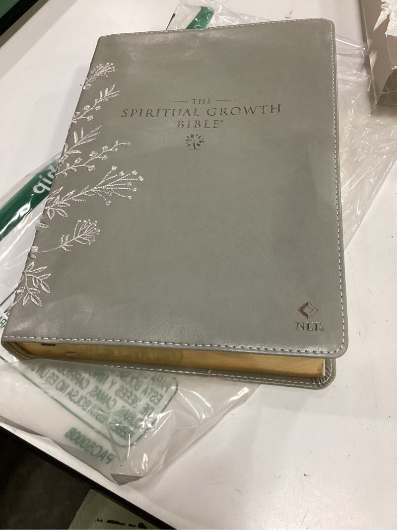 Condition photo showing Good Condition for the spiritual growth bible, study bible, nlt - new living translation holy bible, faux leather, taupe embroidered floral (nlt spiritual growth editions)