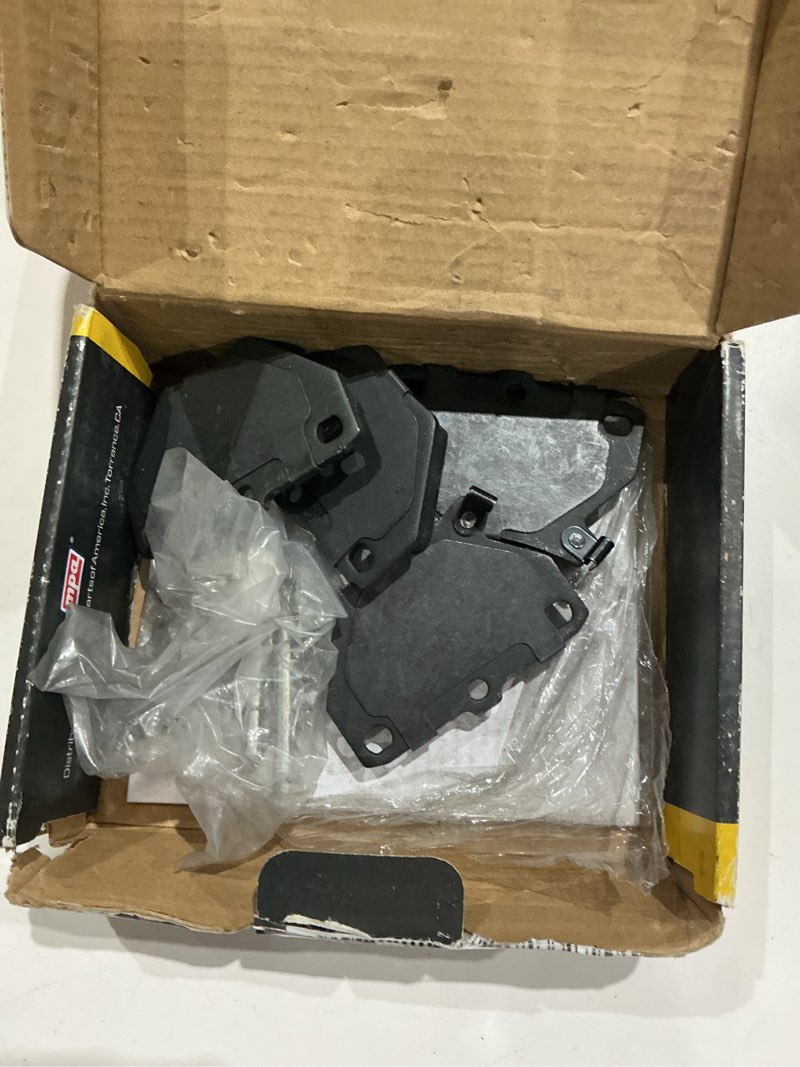 Condition photo showing As Is for quality-built rear semi-metallic brake pads, premium 1001-0823m, compatible with 2000-2007 pontiac/toyota (celica,corolla,matrix,vibe,yaris) bp0823-m