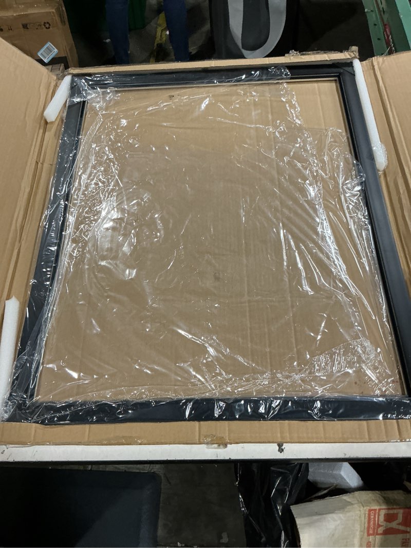 Condition photo showing As Is for arttoframes 26x33 inch black picture frame, this 1.25 inch custom poster frame is soft black - comes with economy acrylic and corrugated backing (2wom5180-26x33) soft black 26 x 33"