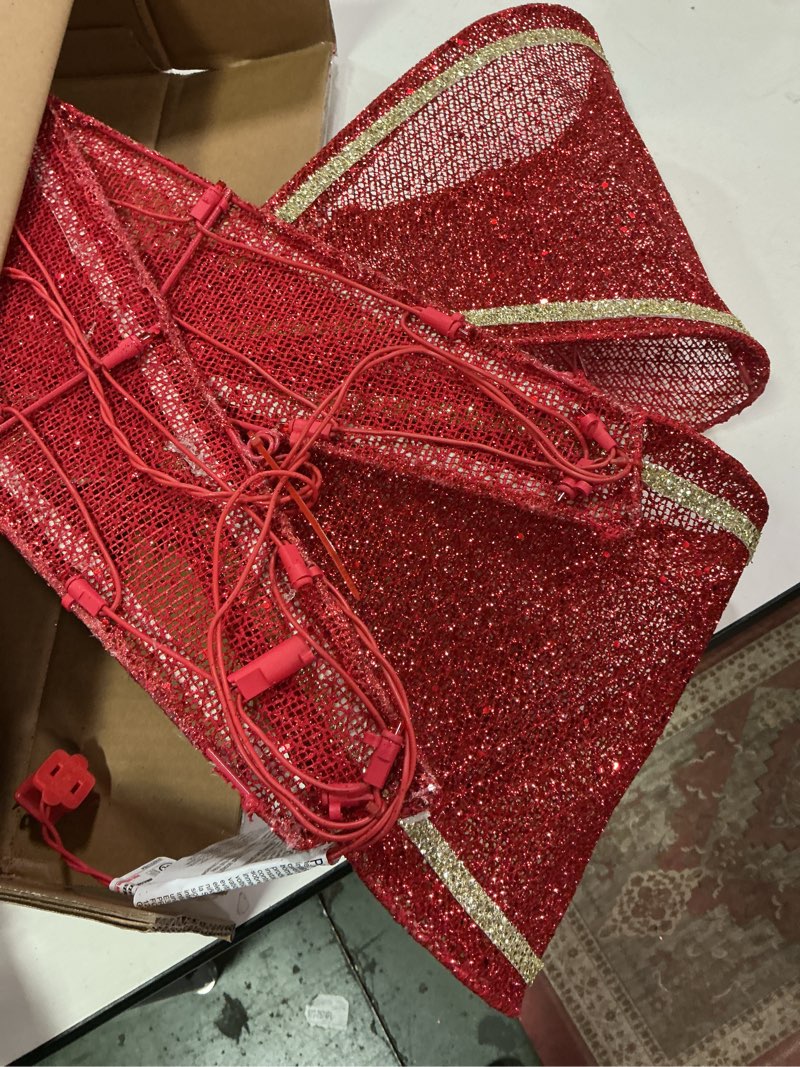 Condition photo showing As Is for Holiday Living 30-in Hanging Bow Door decoration with Red LED Lights