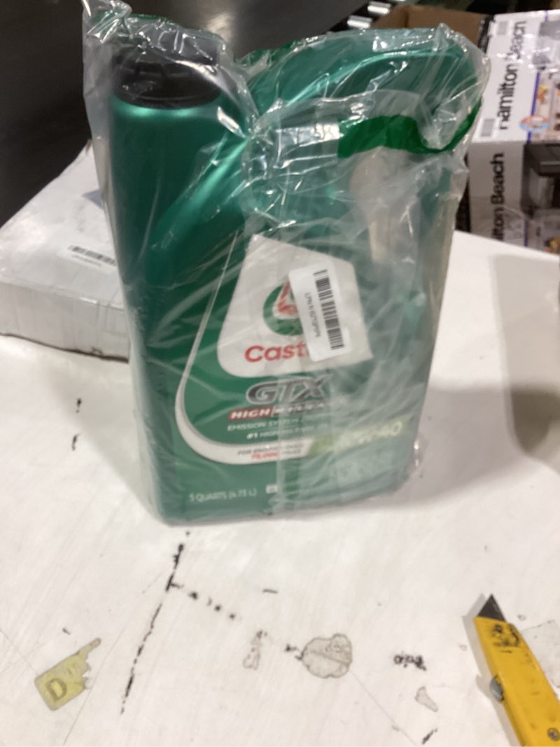 Condition photo showing As Is for castrol gtx high mileage 10w-40 synthetic blend motor oil, 5 quarts
