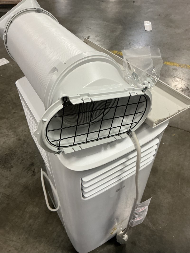 Condition photo showing As Is for 6,000 btu (sacc) / 8,765 btu (ashrae) portable air conditioner | cools up to 250 sq. ft.