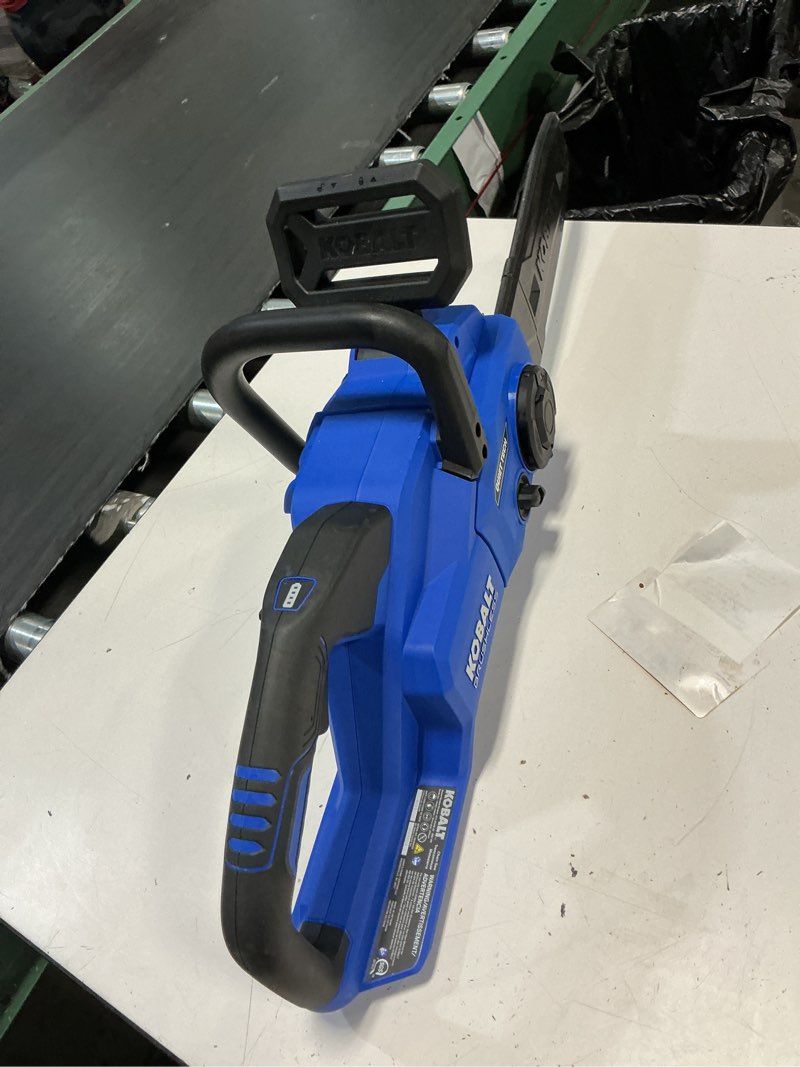 Condition photo showing As Is for kobalt 24v quiet tech brushless 12-in chainsaw starter kit 