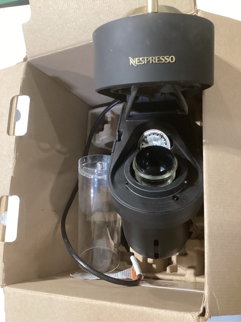 Condition photo showing As Is for nespresso vertuo pop+ deluxe coffee and espresso maker by breville with milk frother, matte black gold machine + milk frother matte black gold