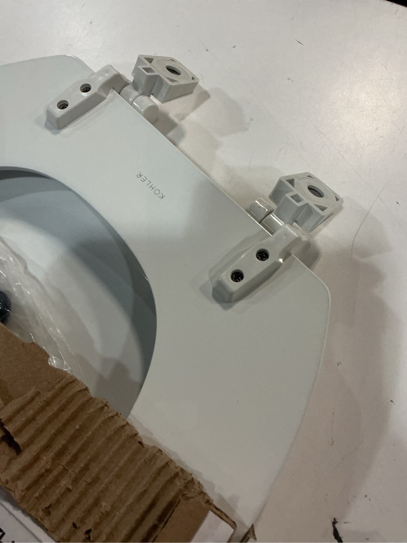 Condition photo showing As Is for kohler 4647-0 stonewood elongated toilet seat, elongated wood seat for standard toilets, comes with color-matched plastic hinges, home essentials, white white elongated
