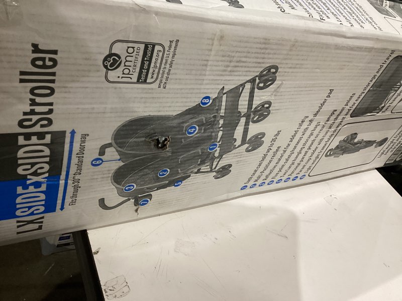 Condition photo showing New/Like New for Delta Children LX Side by Side Stroller - with Recline, Storage & Compact Fold, Night Sky