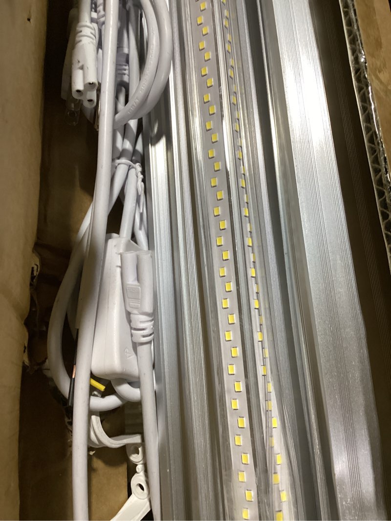 Condition photo showing As Is for 4 pack 8ft led shop light, super bright 15000lm 5000k v shape 8' led shop lights, linkable 8 foot led shop lights for garage warehouse, supermarket, basement, barn, storage area