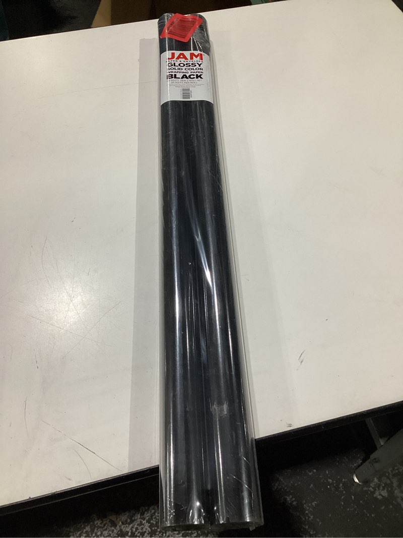 Condition photo showing New/Like New for JAM Paper Gift Wrap - Glossy Wrapping Paper - 50 Sq Ft Total (30 in x 10 Ft Each) - Black - 2 Rolls/Pack 50 Sq Ft (Pack of 2) Black