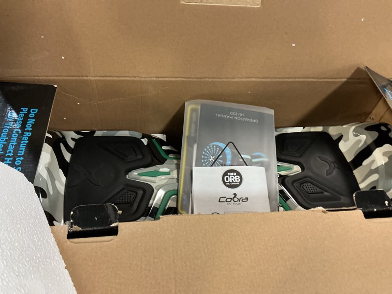 Condition photo showing As Is for Hover-1 i100 Electric Self Balancing Scooter with 7MPH Top Speed, 10 Mile Range, 5HR Full-Charge, Built-In Bluetooth Speaker, Rider Modes: Beginner to Expert Camo Hoverboard