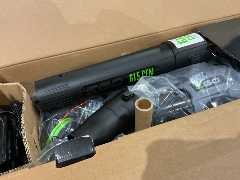 Condition photo showing As Is for ego power+ battery blower/trimmer kit (battery & charger)