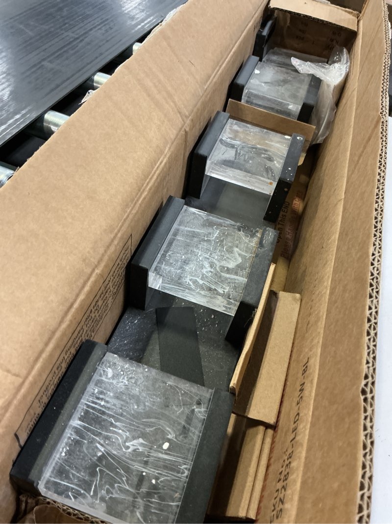 Condition photo showing As Is for MELUCEE LED Bathroom Lighting Fixtures Over Mirror 5 Lights Black LED Vanity Lighting with Unique Smoke Acrylic Panel Modern Led Bathroom Light Bar, 25W 3000K Warm Lighting Black 5 Lights