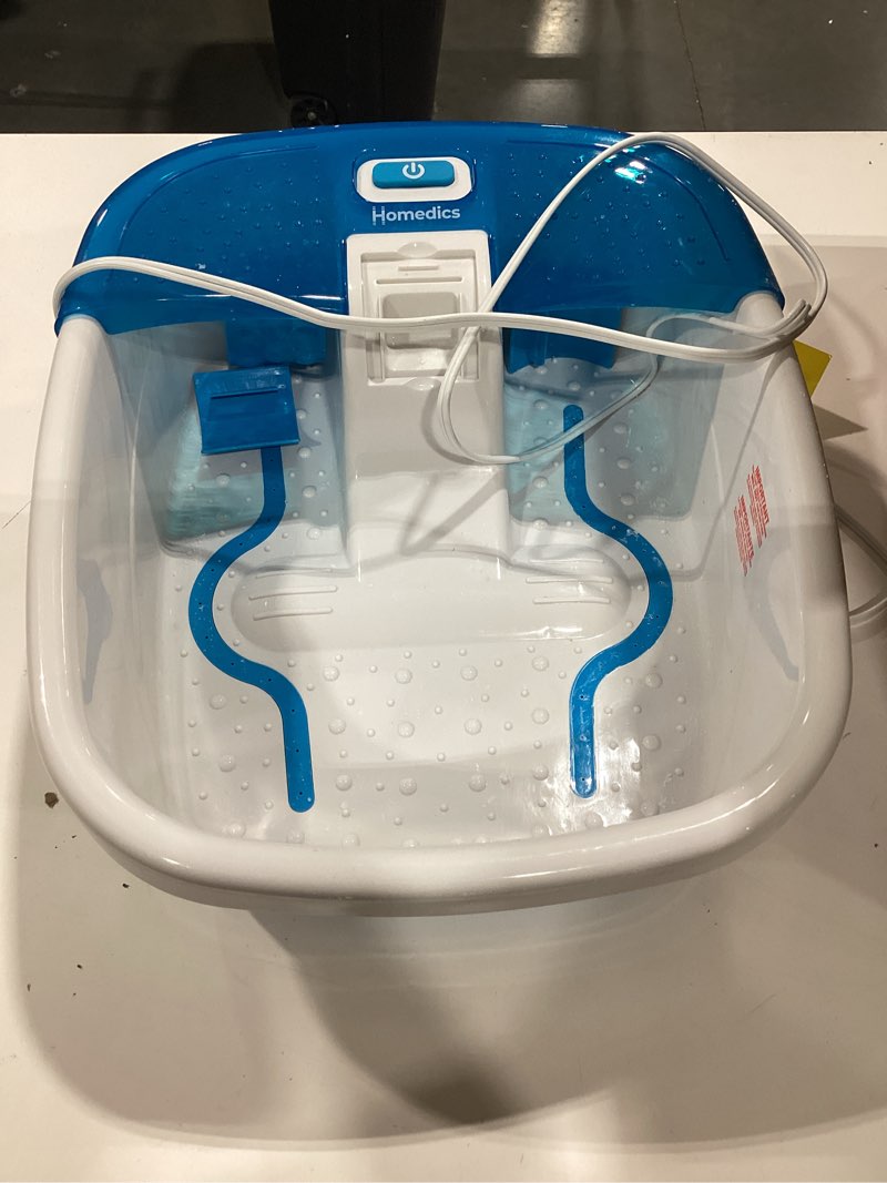 Condition photo showing As Is for homedics bubble bliss deluxe foot spa with heat massaging arch, 3 acupressure attachments, splash guard, raised nodes creates bubbles, improves circulation, soothe tired muscles standard blue