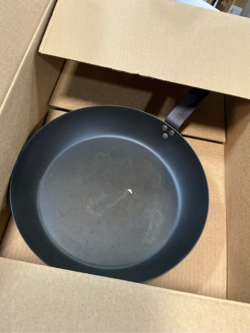 Condition photo showing As Is for merten & storck pre-seasoned carbon steel 12" frying pan skillet, fast heating, naturally nonstick, induction & oven safe, high-heat & open flame compatible, perfect for searing grilling & camping