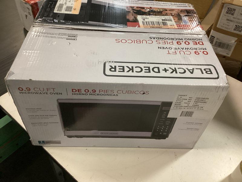 Condition photo showing New/Like New for black+decker digital microwave oven with turntable push-button door, child safety lock, stainless steel, 0.9 cu ft 0.9 cu.ft