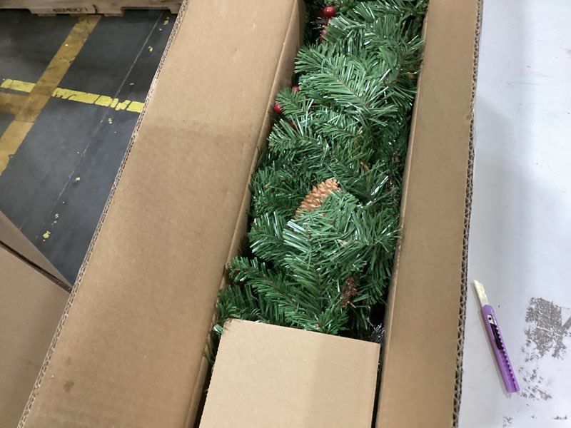 Condition photo showing New/Like New for national tree company 9 ft pre-lit crestwood spruce artificial christmas garland, christmas decoration with glitter, pinecones, red berries, 50 warm white led lights, 180 tips, timer, green battery operated tree