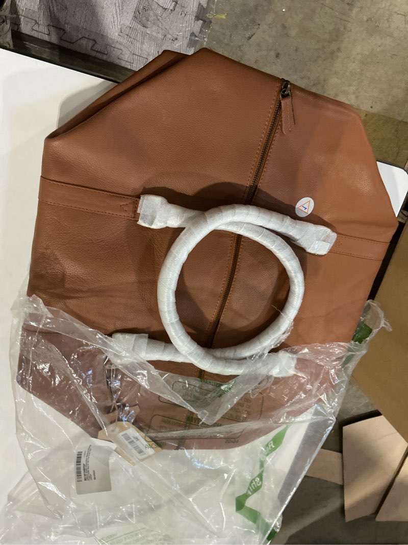 Condition photo showing Good Condition for expandable weekend overnight travel duffel bag in tan top grain cow leather