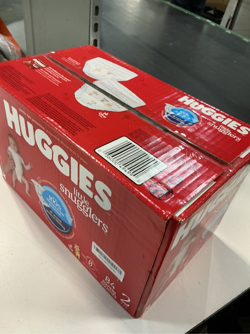 Condition photo showing New/Like New for huggies size 2 diapers, little snugglers baby diapers, size 2 (12-18 lbs), 84 count, packaging may vary size 2 84