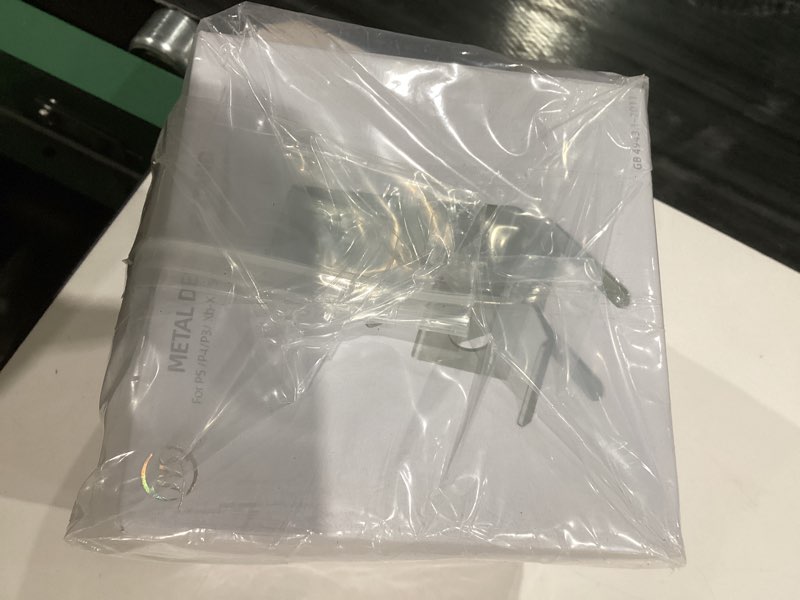 Condition photo showing New/Like New for ASIEIT 2Packs Controller Holder, 2 Tier Universal Aluminum Display Stand for Desk Game Enthusiasts Gift Stand Compatible with Series XS, Elite 2, PS5, PS3, Switch Pro and Almost All Controller Black & Silver