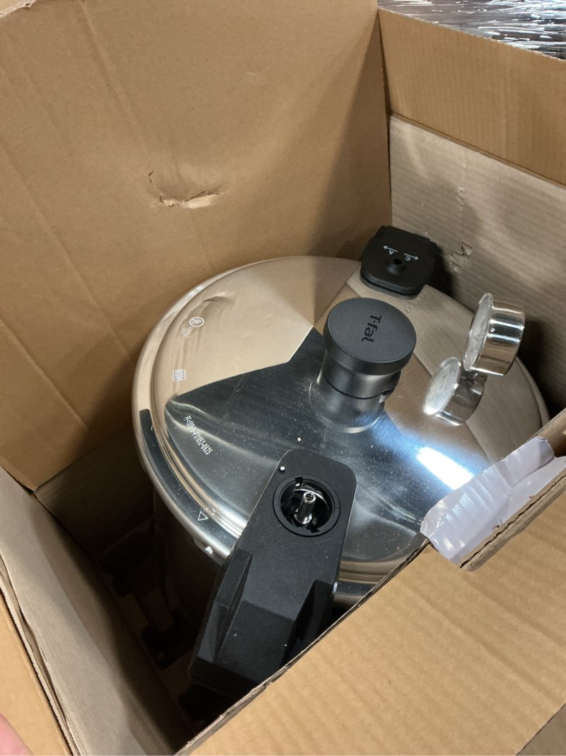 Condition photo showing As Is for T-fal 22-Quart Aluminum Pressure Canner, 3 PSI Settings, Home Canning, Includes Racks & Canning Guide, Large Capacity, Pressure & Water Bath Canning for Vegetables, Meats, Seafood & Fruits, Silver Pressure Canner 22 Quarts