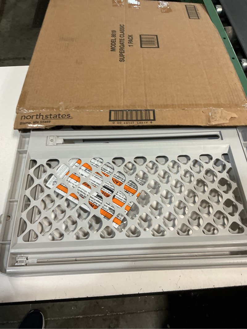 Condition photo showing New/Like New for mypet universal pet gate: 26” - 42” wide dog gate for doorways with pressure fit or swinging door hardware mounting types included: 26" tall; gray