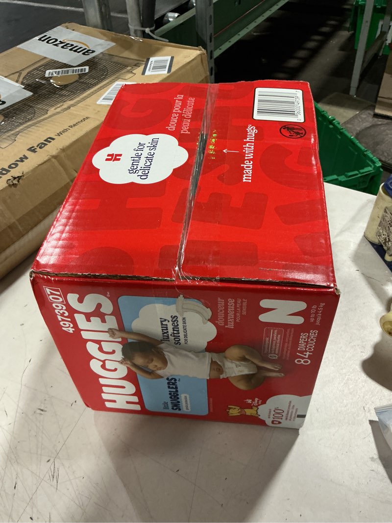 Condition photo showing New/Like New for huggies little snugglers newborn diapers, 84 count newborn 84